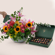 Bouquet of flowers and a box of chocolates