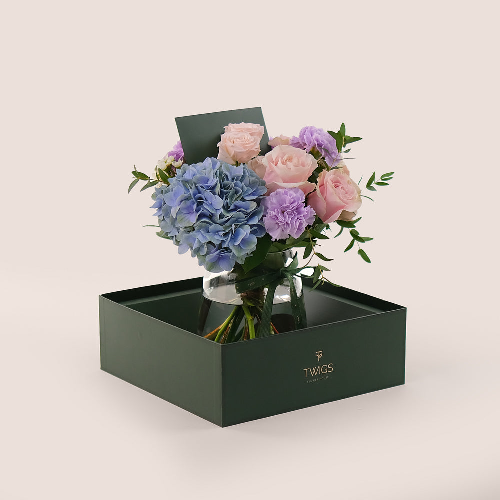 Pink Roses & Lavender Carnations in a Flower Vase – Soft Elegance with a Touch of Charm