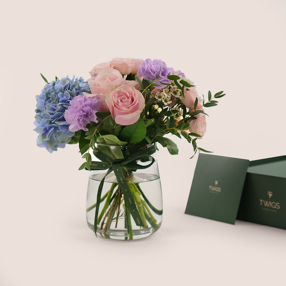 Pink Roses & Lavender Carnations in a Flower Vase – Soft Elegance with a Touch of Charm