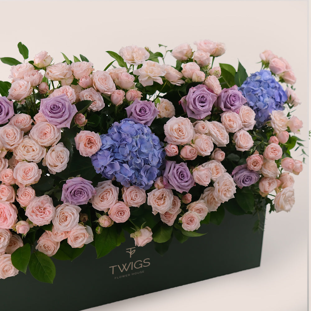 Premium Flowers in a Garden Box – A Lush Display of Purple Hydrangeas, Lavender Roses & Bombastic Blooms