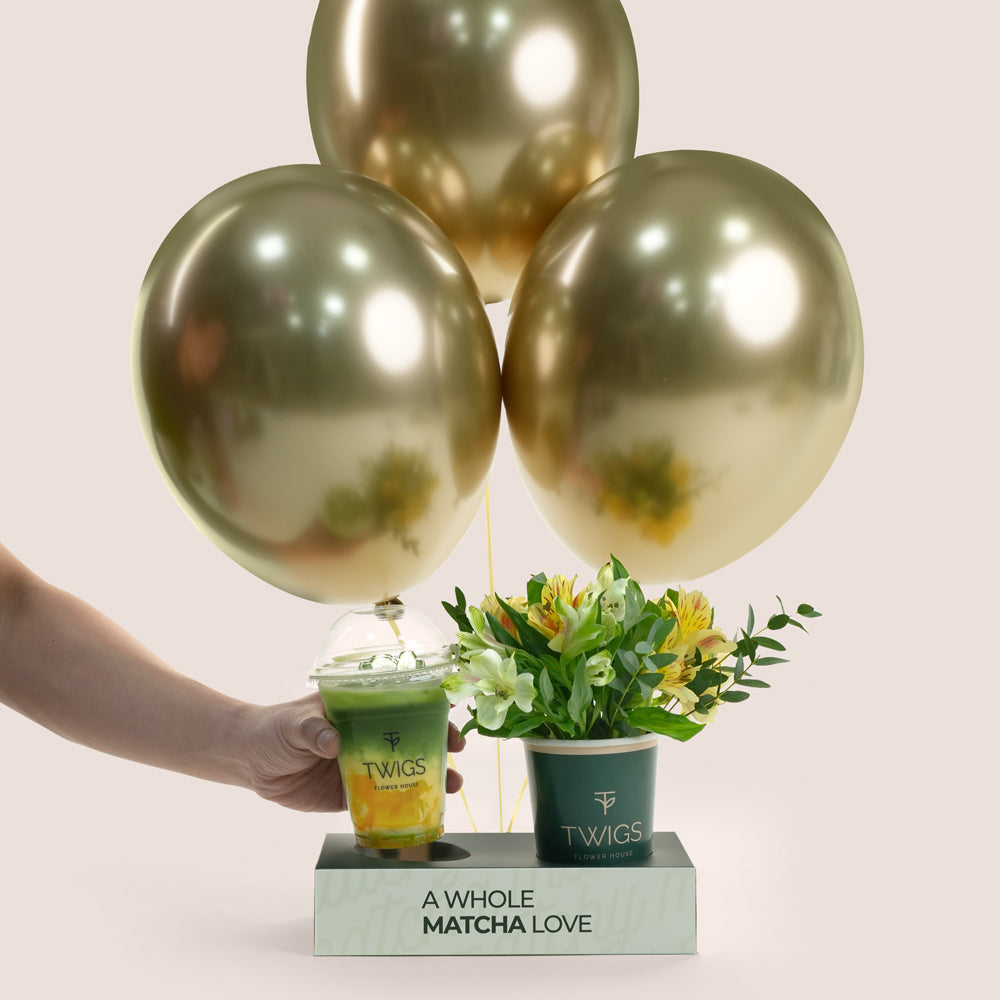 Mango matcha with flowers and balloons twigs uae