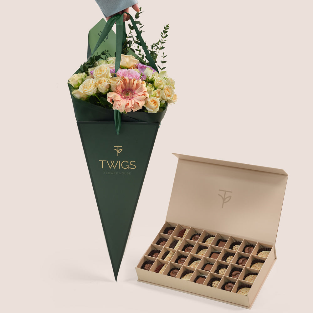 Peach Harmony flower arrangement in TWIGS cone bag paired with 32 piece premium chocolate gift box