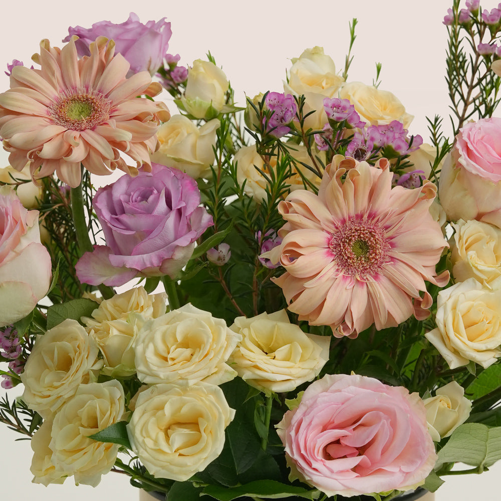 Peach Harmony – Deluxe Flower Arrangement in TWIGS Round Box
