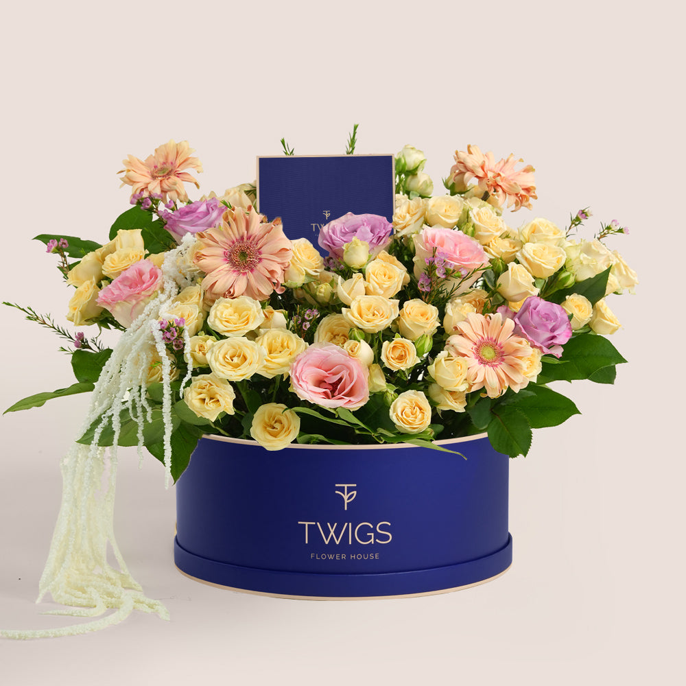 Peach Harmony – Pastel Flower Arrangement in TWIGS Beige Round Box