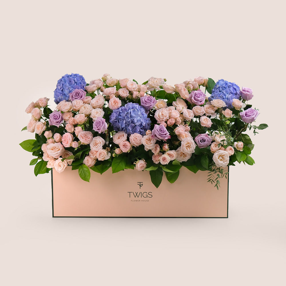 Premium Flowers in a Garden Box – A Lush Display of Purple Hydrangeas, Lavender Roses & Bombastic Blooms