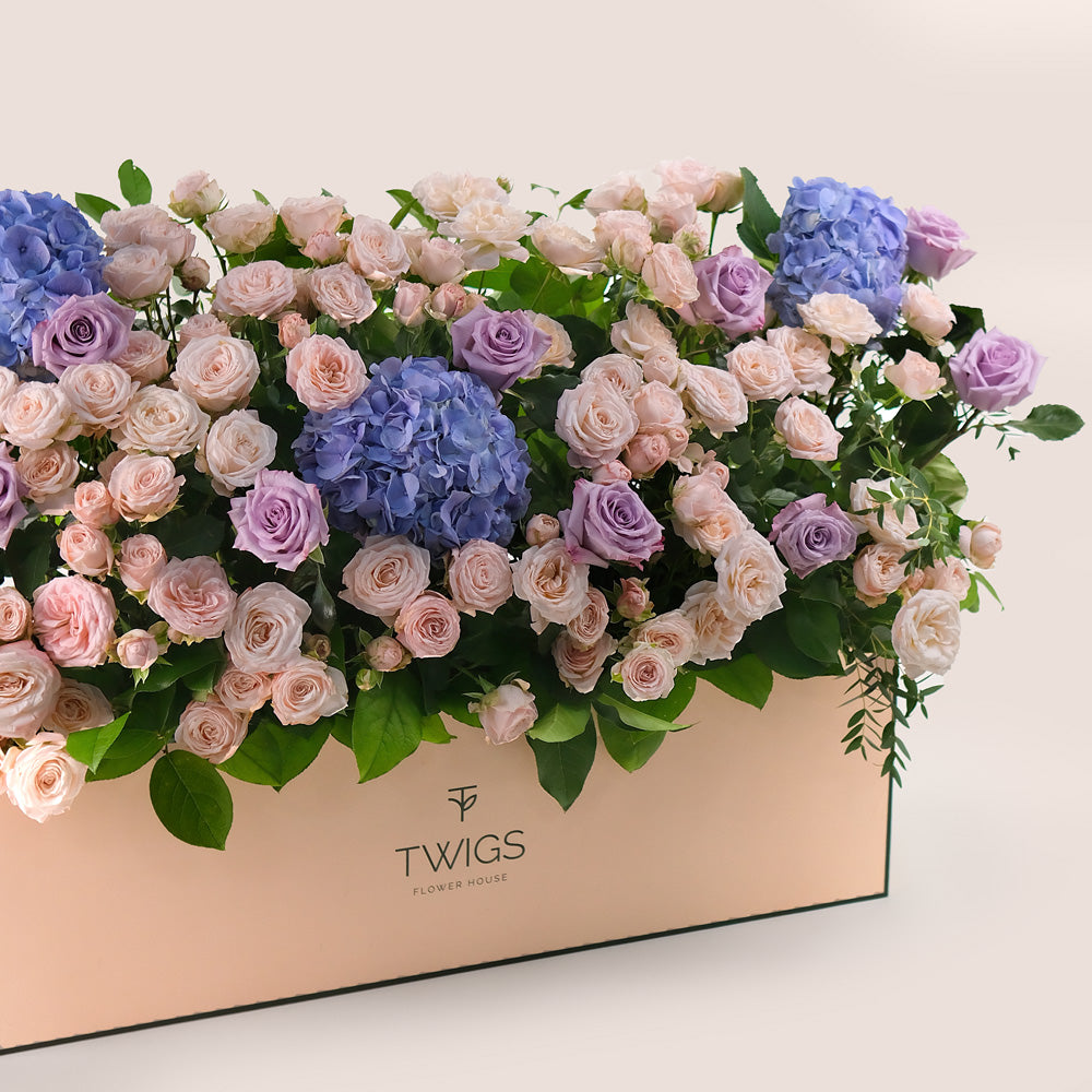 Premium Flowers in a Garden Box – A Lush Display of Purple Hydrangeas, Lavender Roses & Bombastic Blooms