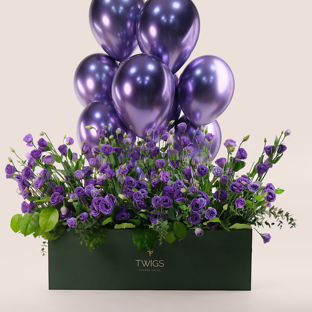 purple flowers with matching balloons twigs.ae 