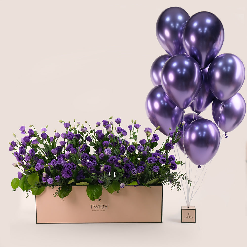 purple flowers with matching balloons twigs.ae 