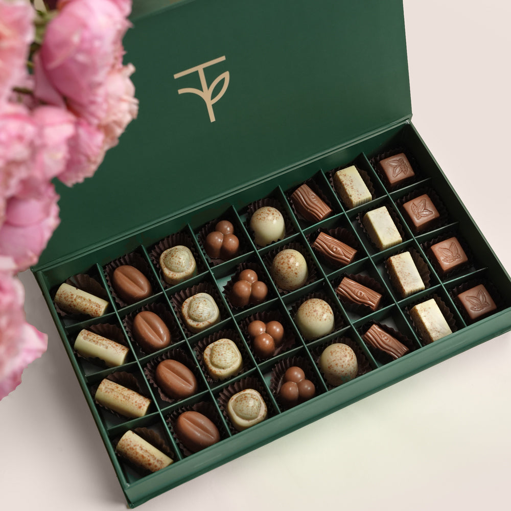 Thuraya ثريا & Chocolates Grande Round Flower Box · Juliet & Quicksand Roses · TWIGS 32-Piece Premium Chocolate Box · Eid Gift Set