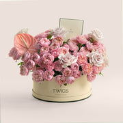 Juliet spray roses and Quicksand garden roses in TWIGS Grande green round flower box — Eid Al Adha gift Dubai