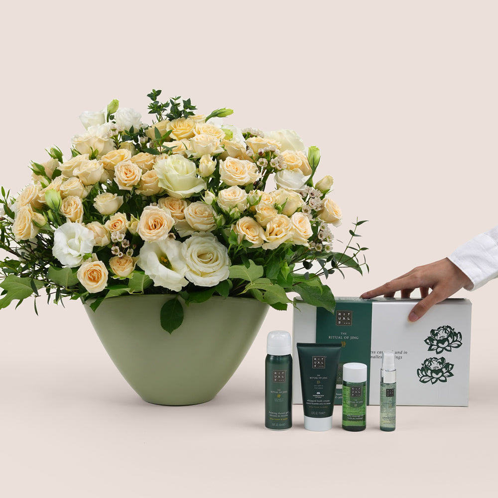 Bouquet of flowers with skincare products 