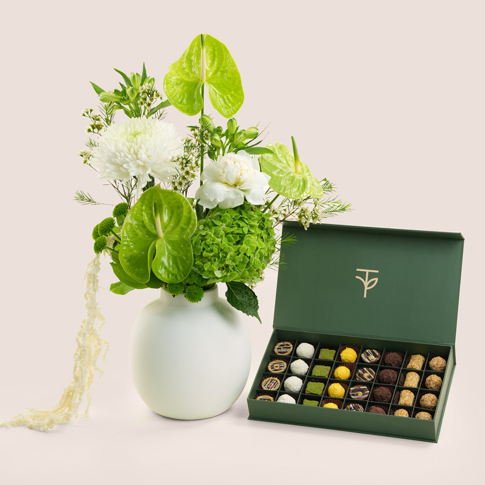 Green anthurium and white chrysanthemum ceramic vase arrangement with 32-piece truffle box — Eid Al Adha gift set Dubai