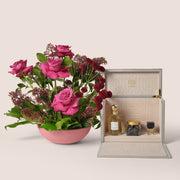 Premium pink rose vase arrangement paired with Lootah Essential fragrance gift set – luxury flower bundle UAE
