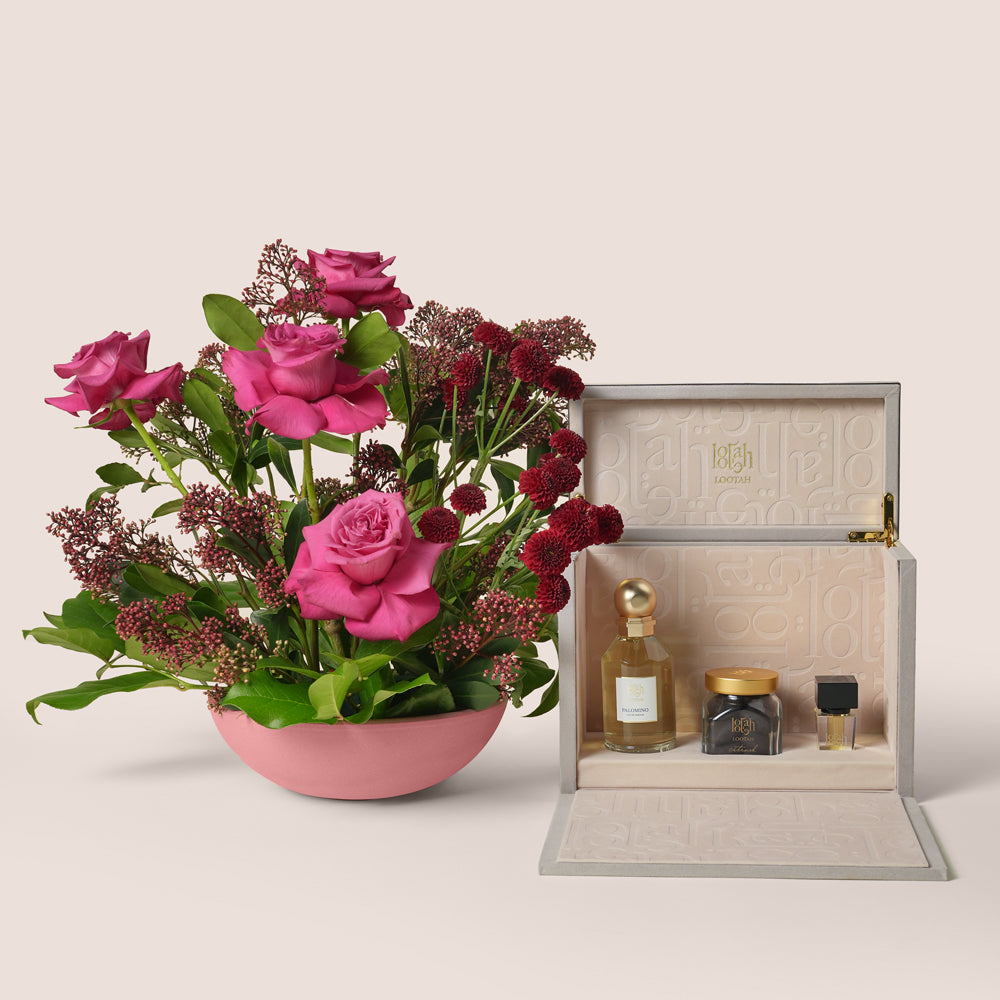 Premium pink rose vase arrangement paired with Lootah Essential fragrance gift set – luxury flower bundle UAE