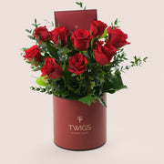 A Dozen Red Roses in Limited Edition Burgundy Round Box
