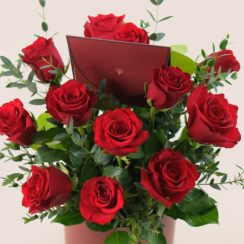 A Dozen Red Roses in Limited Edition Burgundy Round Box