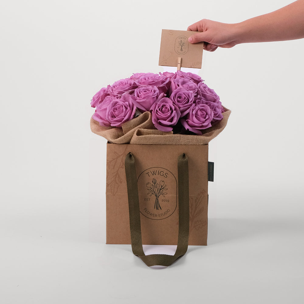 Roses Purple Flowers Bouquet In A Bag