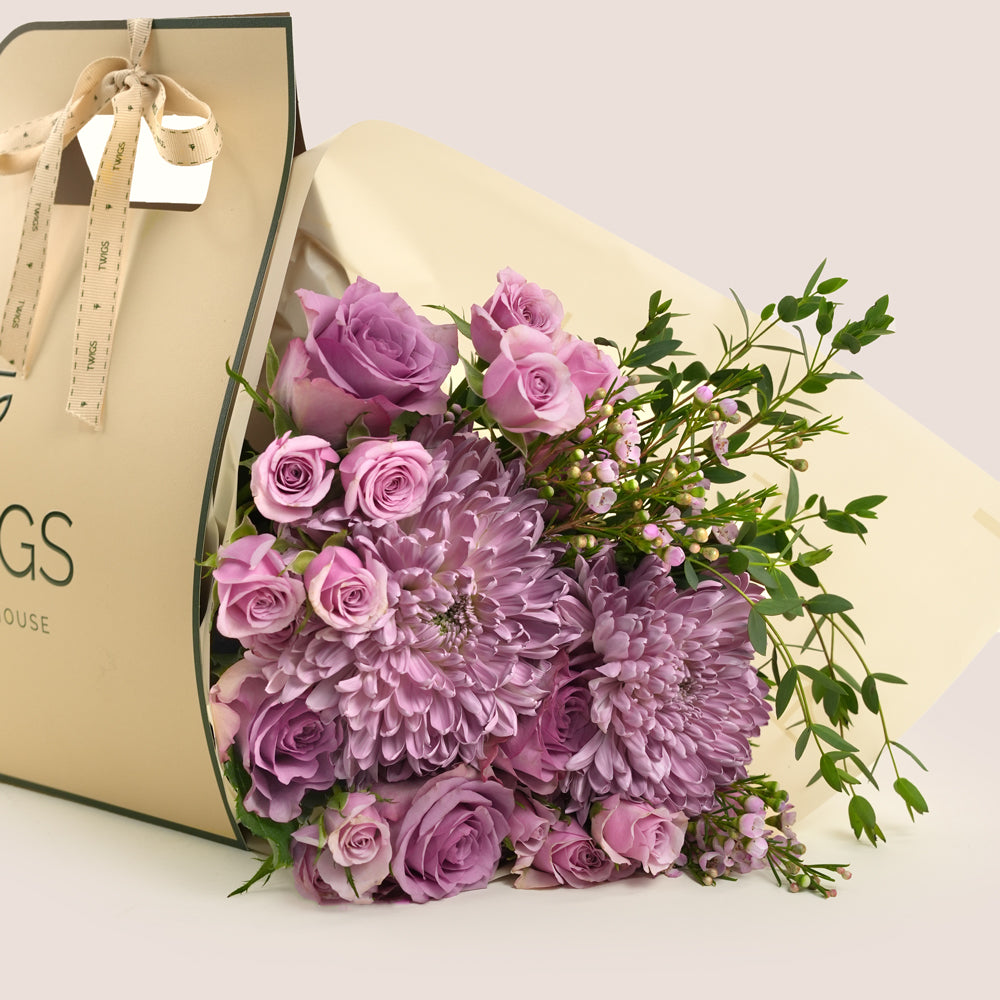 Emirati Women's Day lavender roses and purple chrysanthemums hand-tied bunch in a TWIGS bag, Green and Beige options
