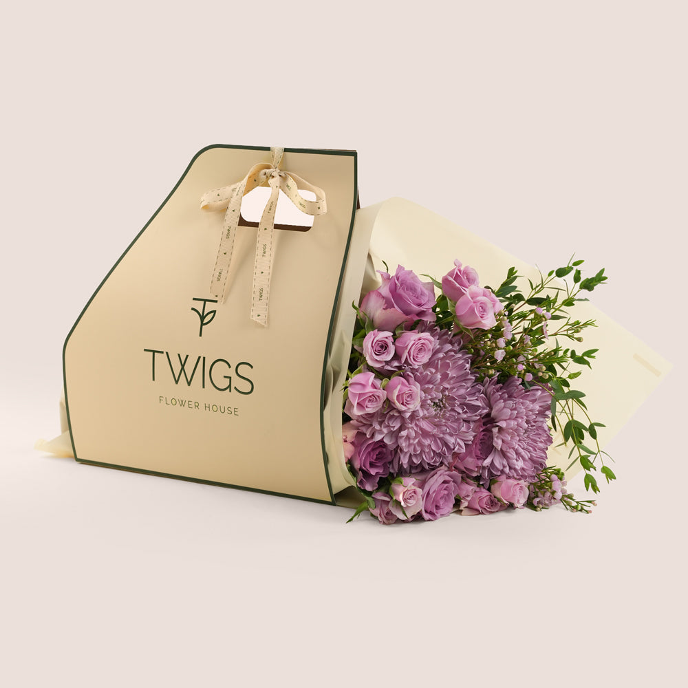 Emirati Women's Day lavender roses and purple chrysanthemums hand-tied bunch in a TWIGS bag, Green and Beige options