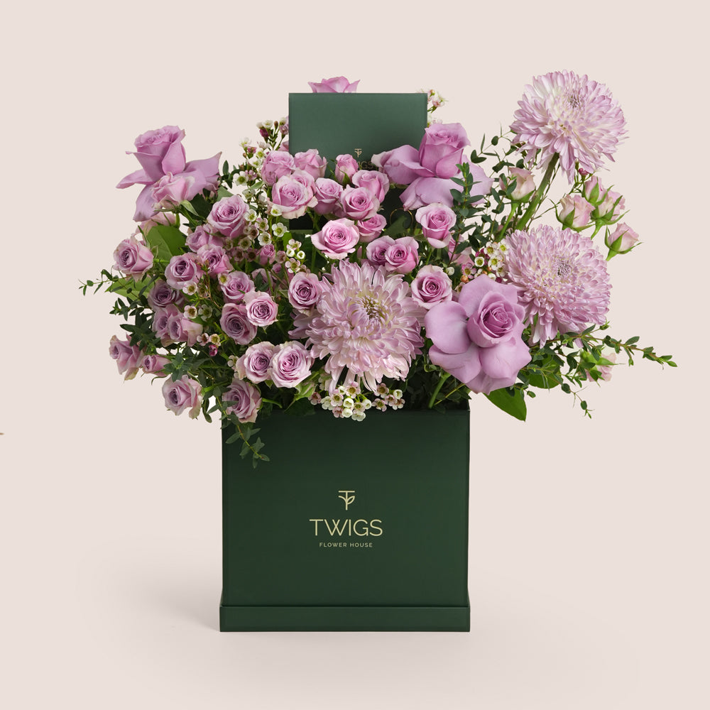 Emirati Women's Day lavender roses and purple chrysanthemums arranged in a TWIGS square flower box, Green and Beige options