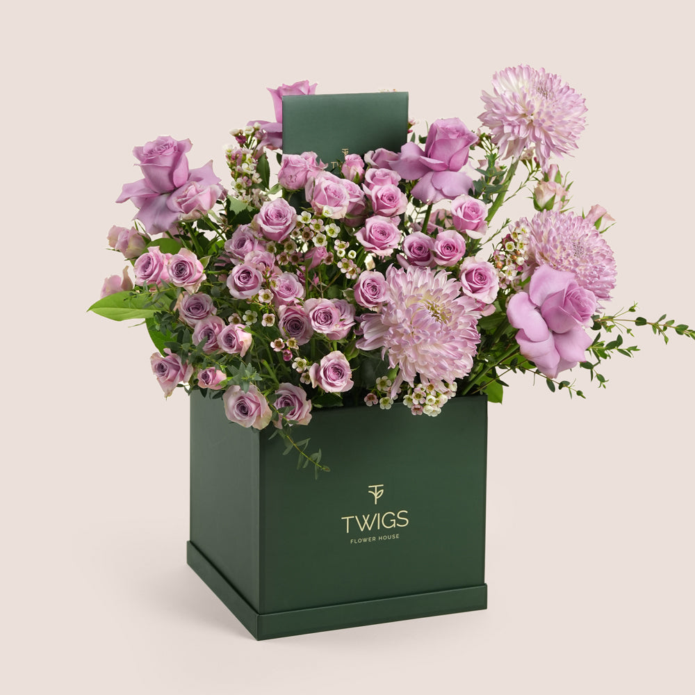Emirati Women's Day lavender roses and purple chrysanthemums arranged in a TWIGS square flower box, Green and Beige options