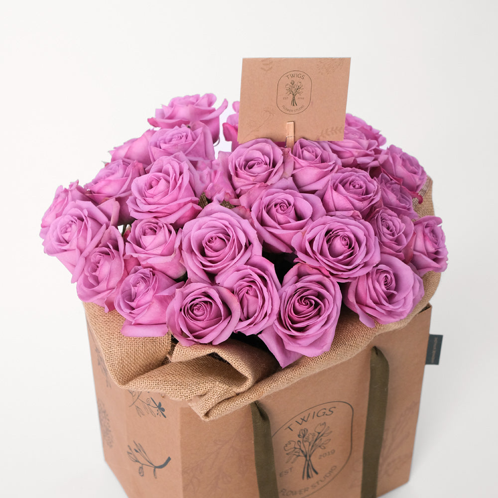 Roses Purple Flowers Bouquet In A Bag