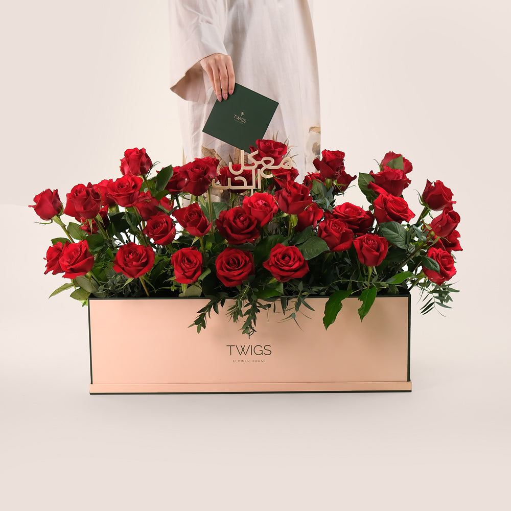 Premium Red Roses in TWIGS Signature Flower Garden Box – A Bold Gesture with a Heartfelt Arabic Touch