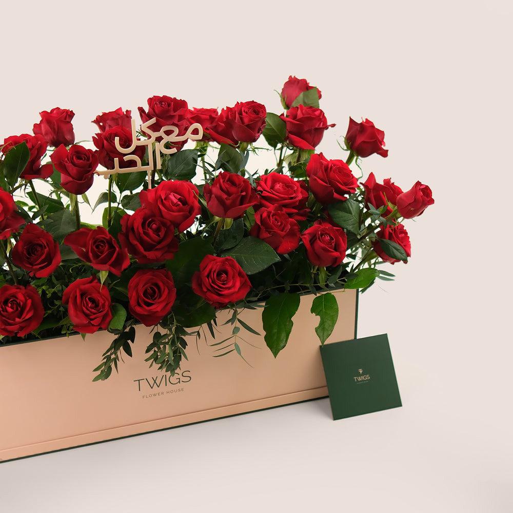 Premium Red Roses in TWIGS Signature Flower Garden Box – A Bold Gesture with a Heartfelt Arabic Touch