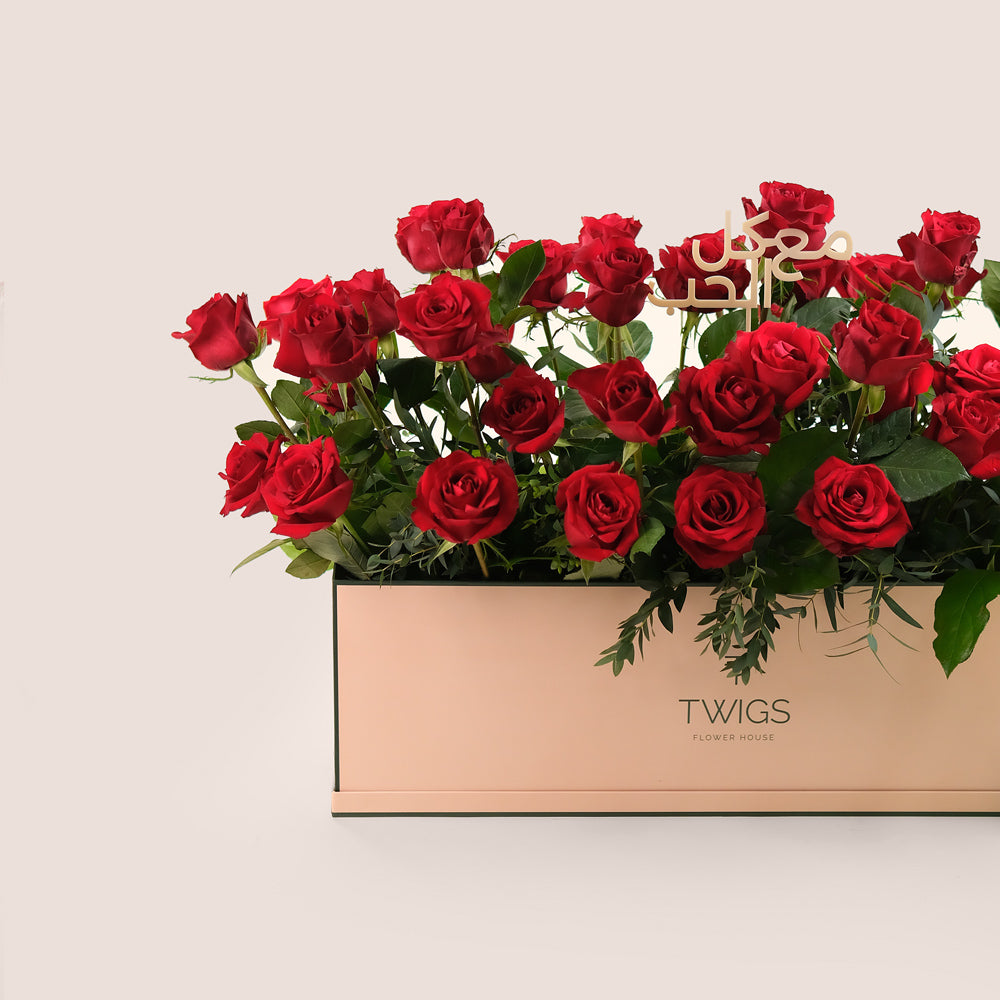 Premium Red Roses in TWIGS Signature Flower Garden Box – A Bold Gesture with a Heartfelt Arabic Touch