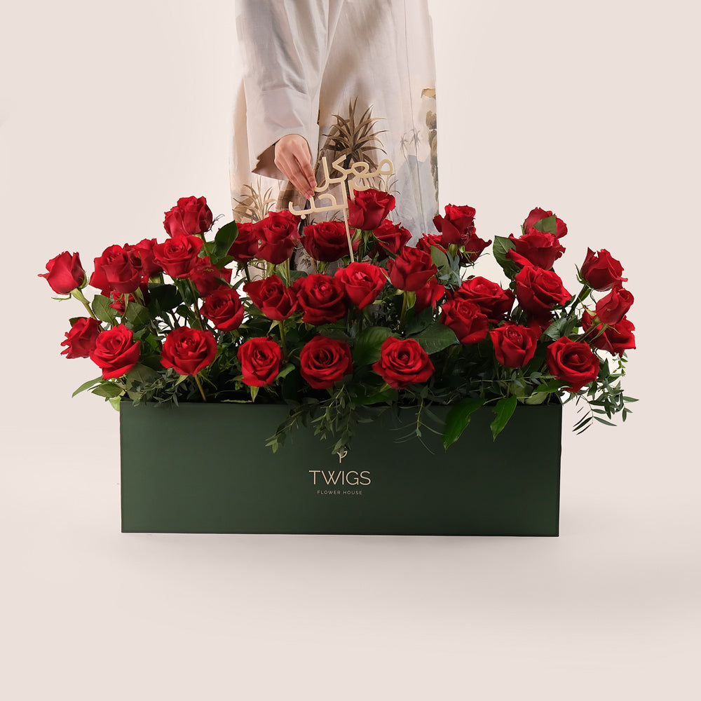 Premium Red Roses in TWIGS Signature Flower Garden Box – A Bold Gesture with a Heartfelt Arabic Touch