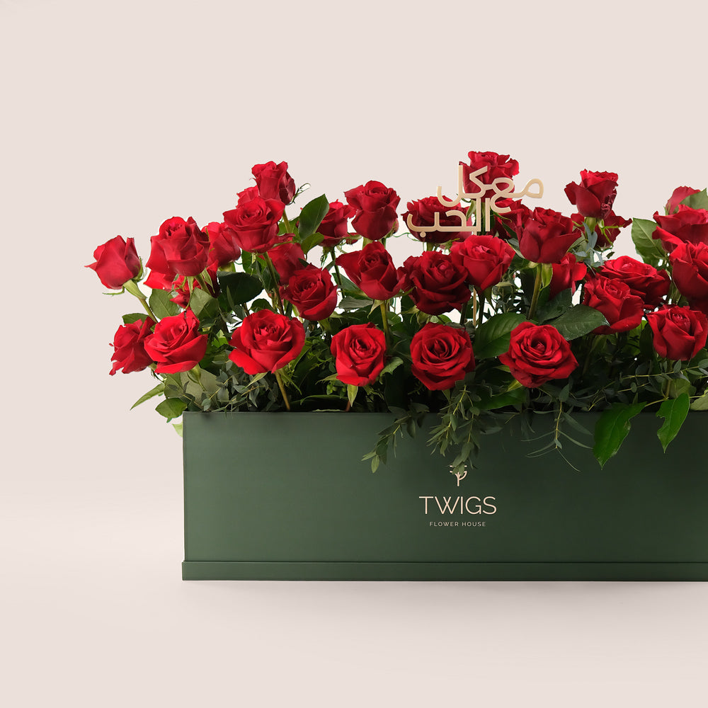 Premium Red Roses in TWIGS Signature Flower Garden Box – A Bold Gesture with a Heartfelt Arabic Touch