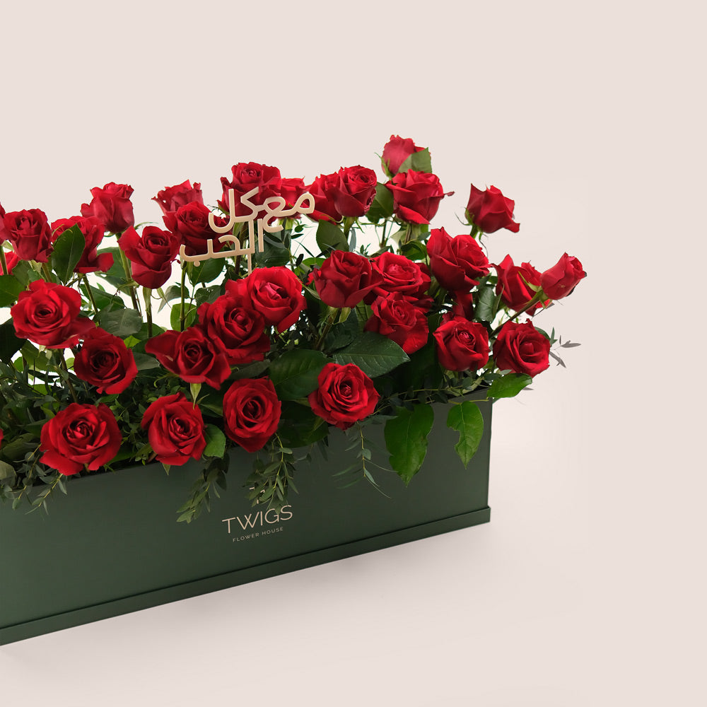 Premium Red Roses in TWIGS Signature Flower Garden Box – A Bold Gesture with a Heartfelt Arabic Touch