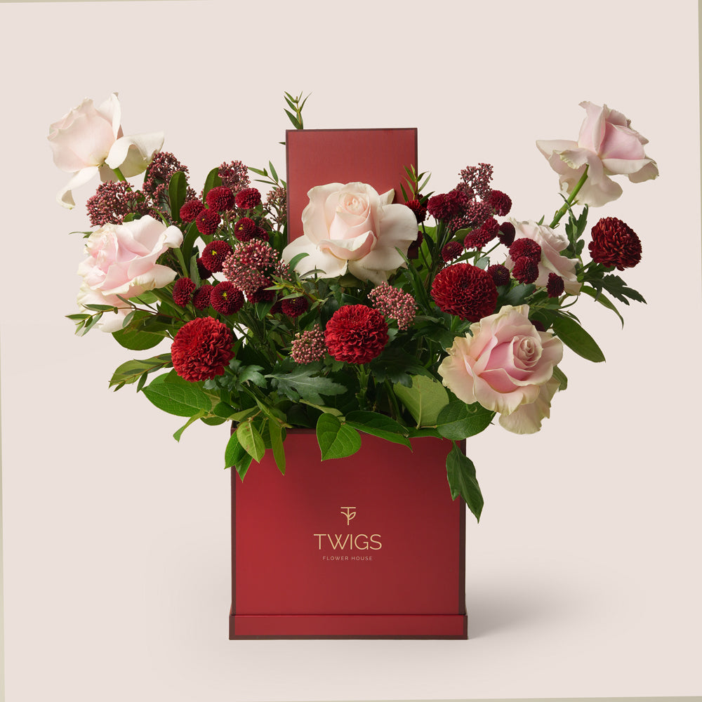 Luxury Ramadan burgundy flower box with Mondial roses, burgundy mums and skimmia in TWIGS square box – UAE delivery