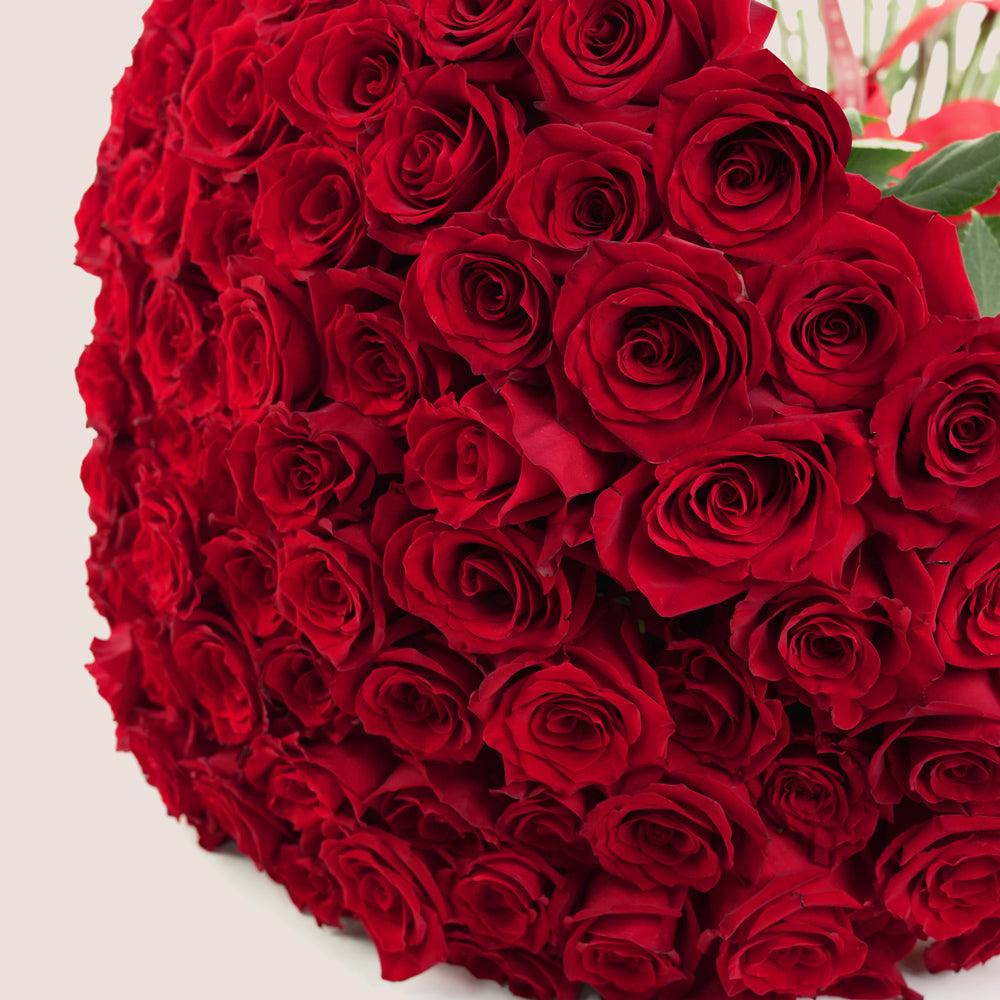 Romantic 100 red roses bouquet gift delivered in Dubai
