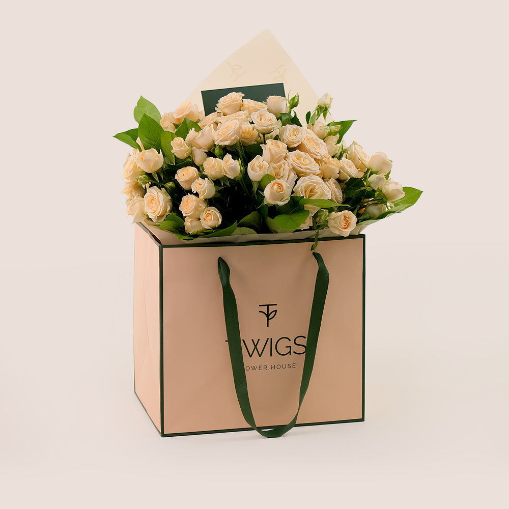 Soft Cream Spray Roses Hand Bouquet – A Touch of Elegance in a Chic Flower Gift Bag