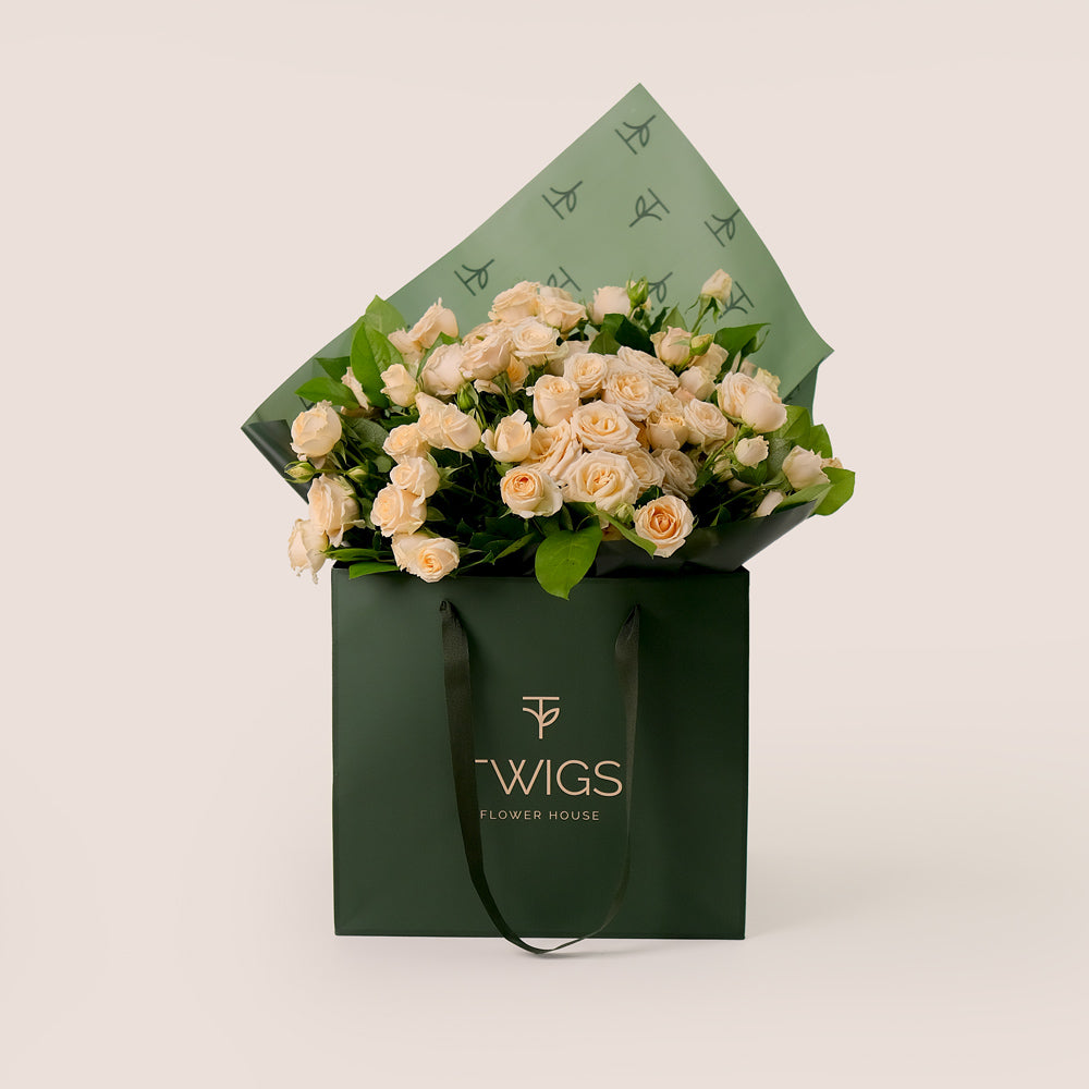 Soft Cream Spray Roses Hand Bouquet – A Touch of Elegance in a Chic Flower Gift Bag