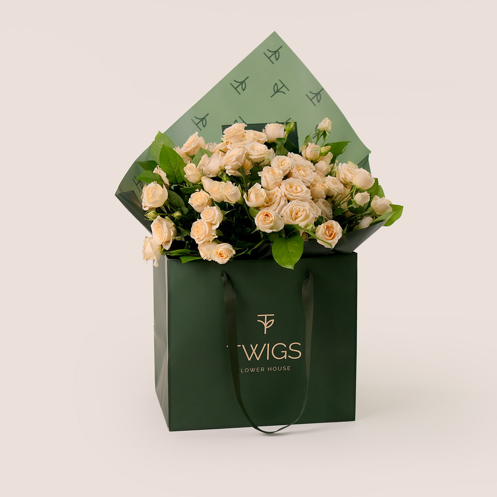 Soft Cream Spray Roses Hand Bouquet – A Touch of Elegance in a Chic Flower Gift Bag