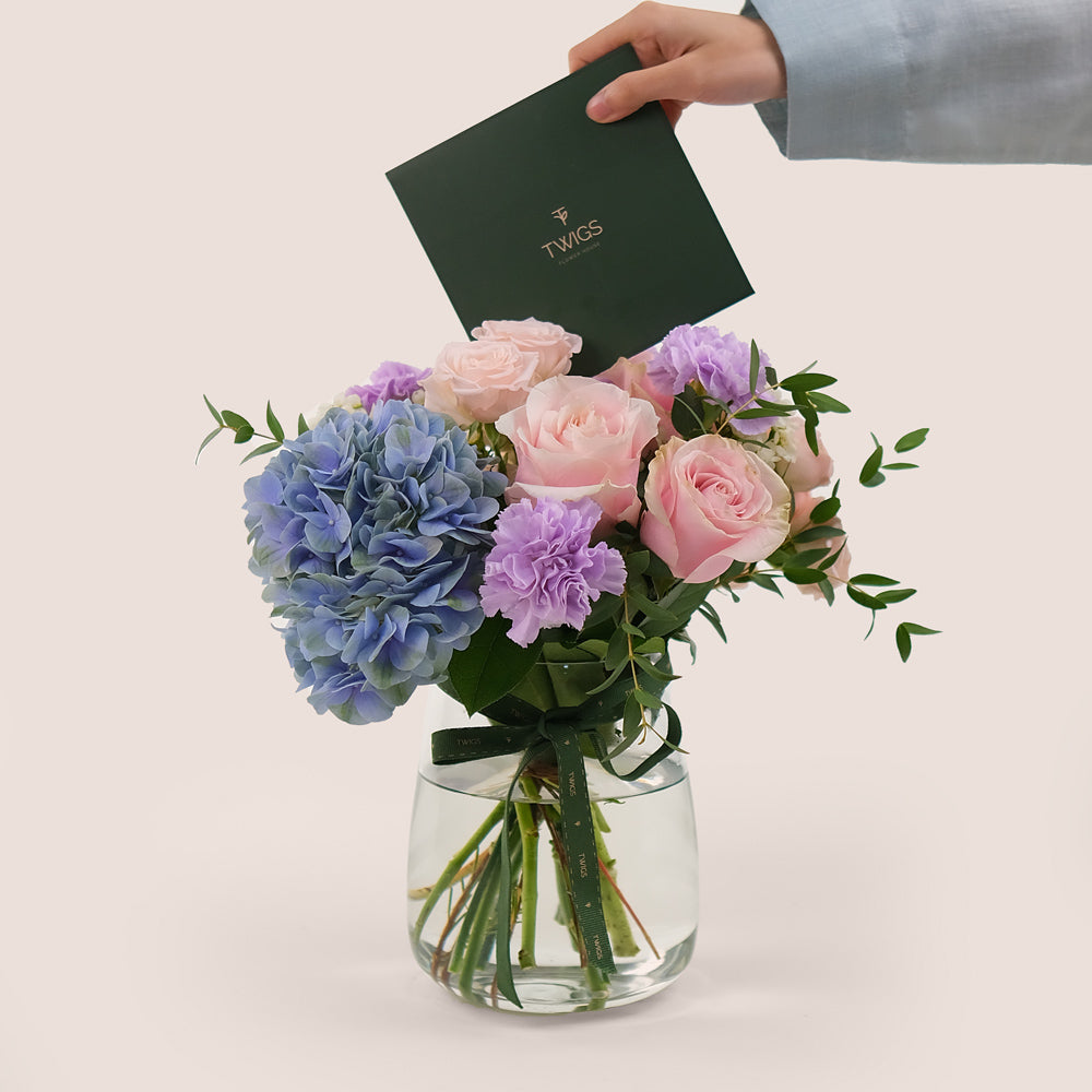 Pink Roses & Lavender Carnations in a Flower Vase – Soft Elegance with a Touch of Charm