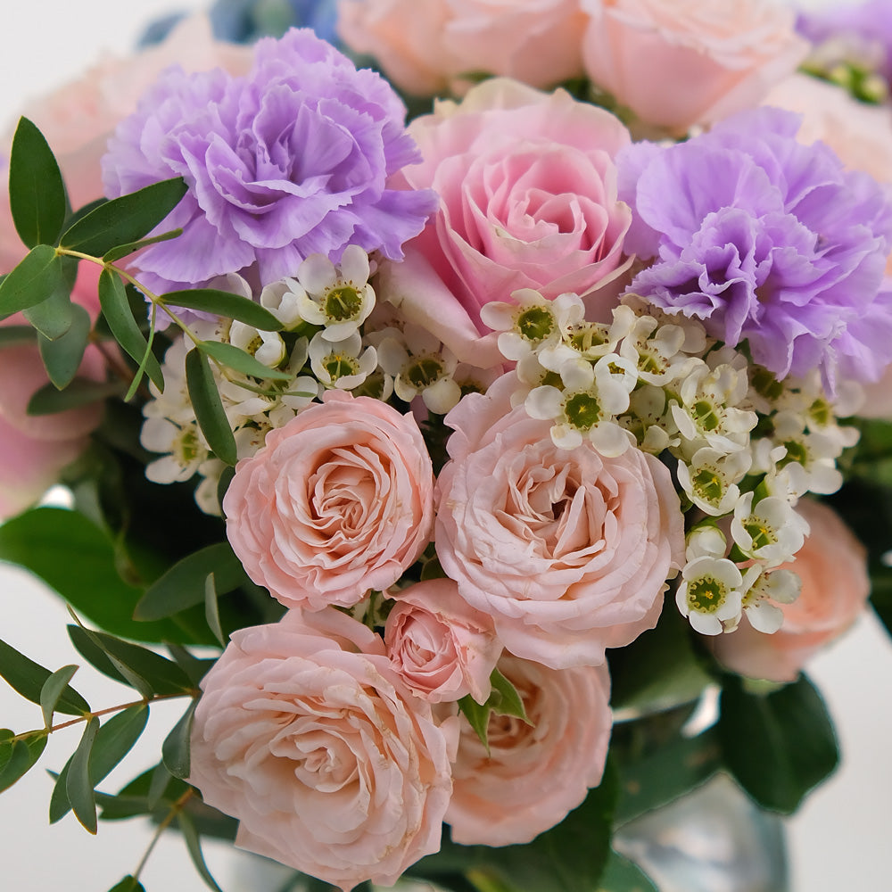 Pink Roses & Lavender Carnations in a Flower Vase – Soft Elegance with a Touch of Charm