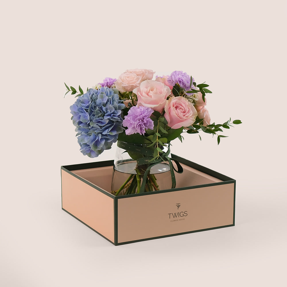 Pink Roses & Lavender Carnations in a Flower Vase – Soft Elegance with a Touch of Charm