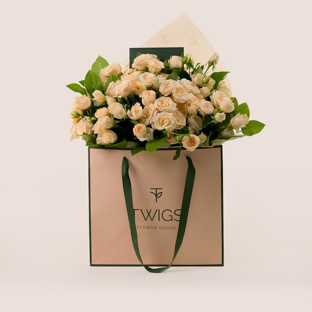 Soft Cream Spray Roses Hand Bouquet – A Touch of Elegance in a Chic Flower Gift Bag