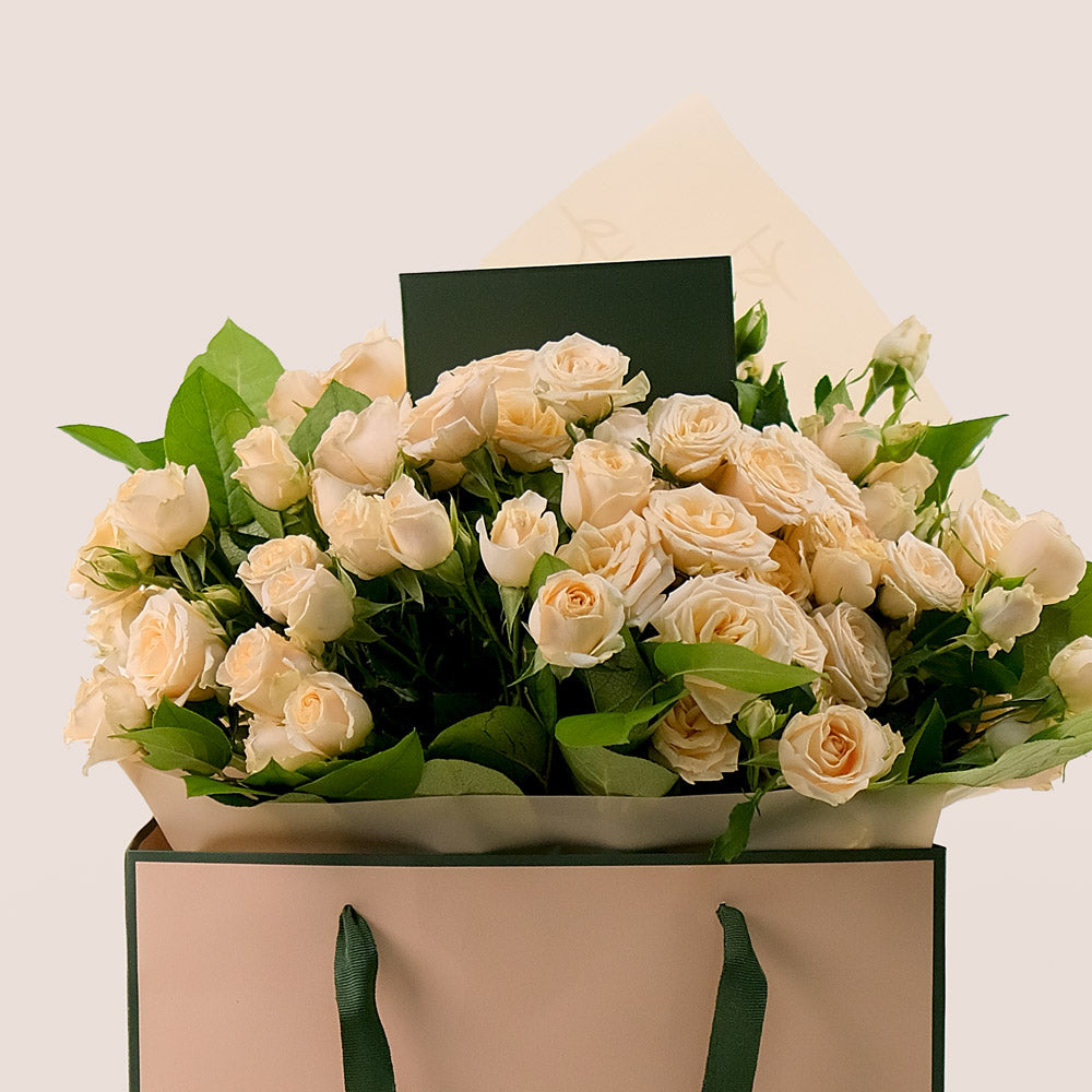 Soft Cream Spray Roses Hand Bouquet – A Touch of Elegance in a Chic Flower Gift Bag