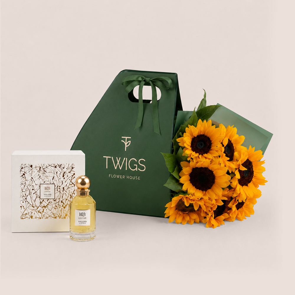 Sunflower bouquet in TWIGS green carry bag with Yoland perfume by Lootah
