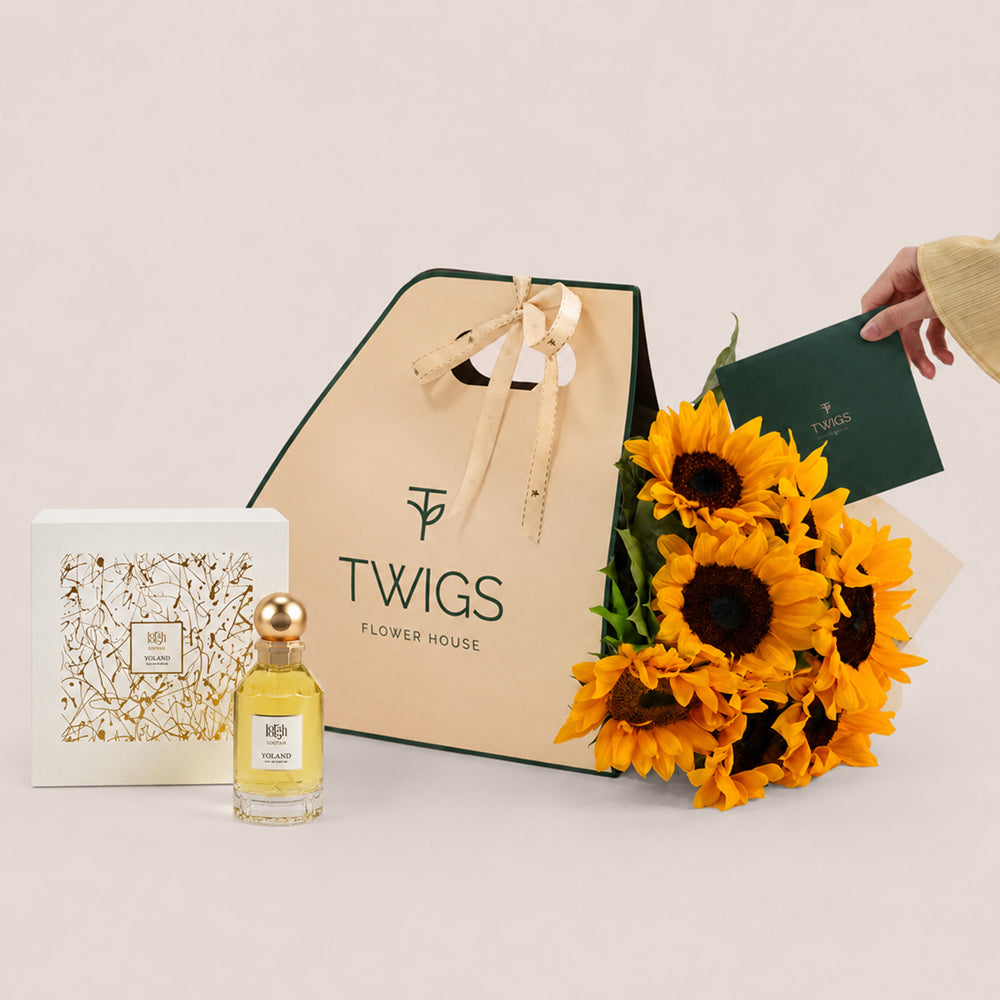 Sunflower bouquet in TWIGS beige carry bag with Yoland perfume by Lootah