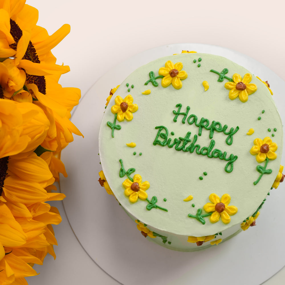 Birthday flowers with sunflower cake 