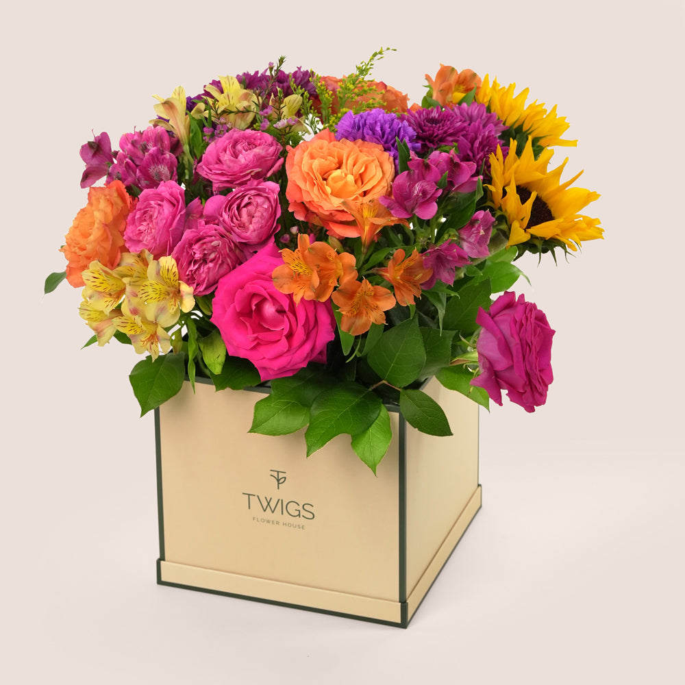 Send the Sunshine Celebration Flower Box with same day flower delivery in Dubai. Buy flowers online from TWIGS, one of the best flower shops in UAE.