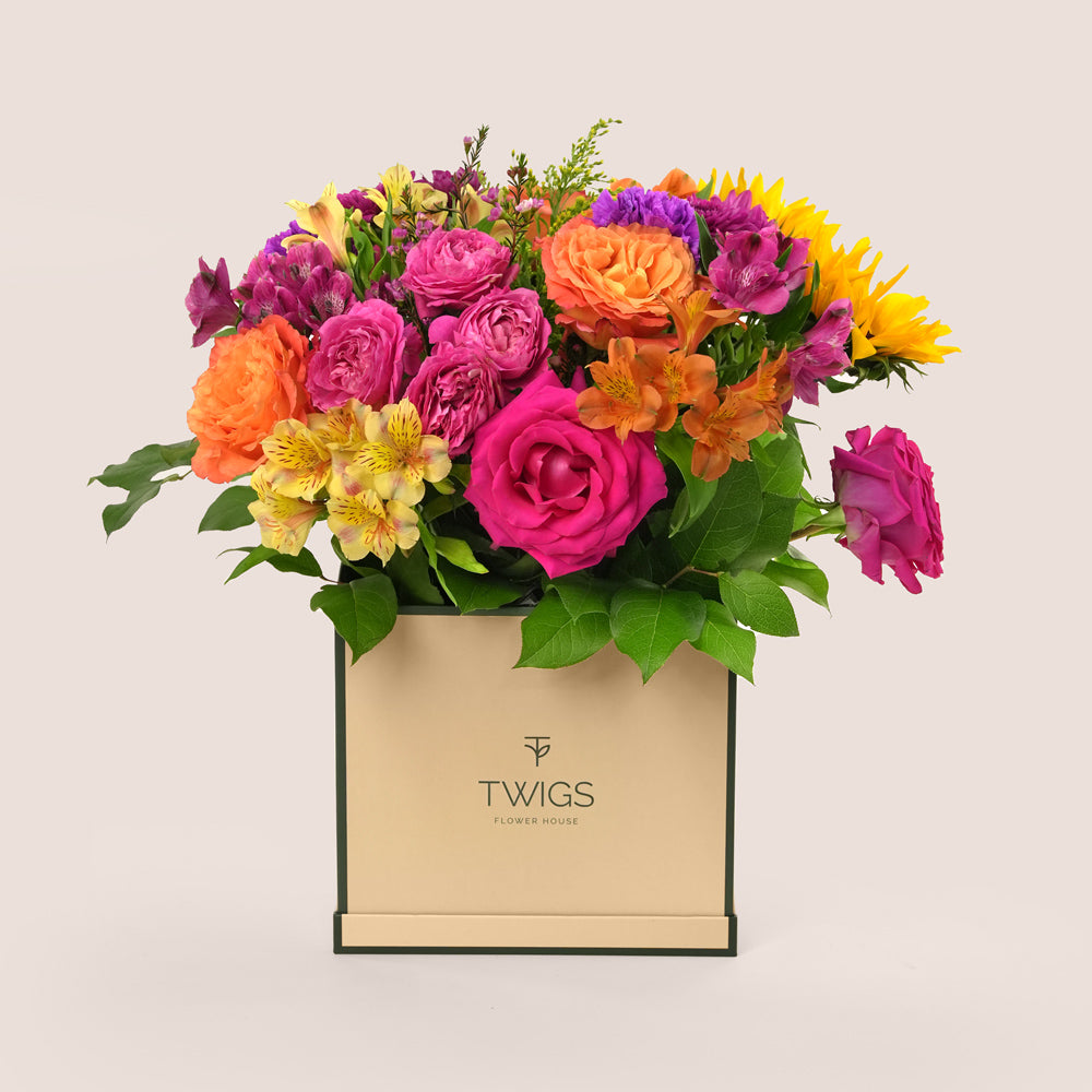Send the Sunshine Celebration Flower Box with same day flower delivery in Dubai. Buy flowers online from TWIGS, one of the best flower shops in UAE.