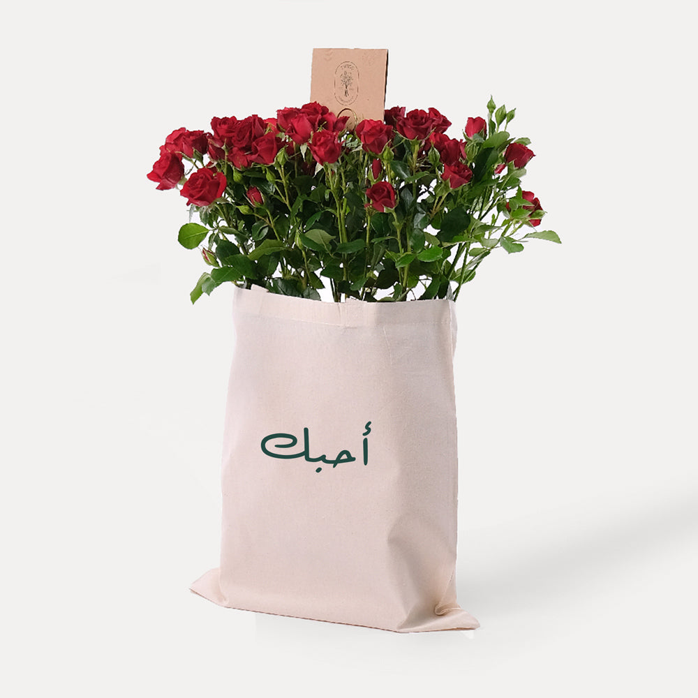 Red Spray Roses in a Reusable Canvas Tote – Classic Romance with a Modern Twist