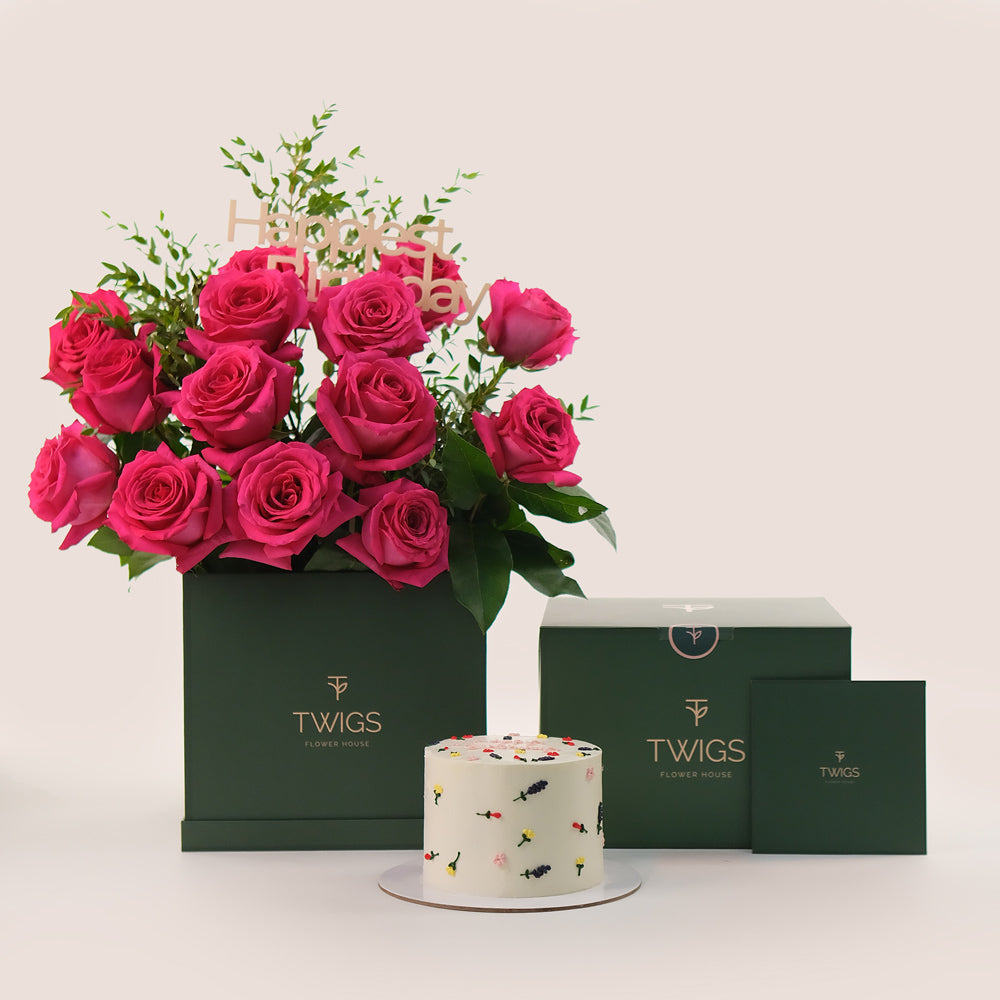 Fresh flowers fuchsia roses and cake gift bundle TWIGS Dubai