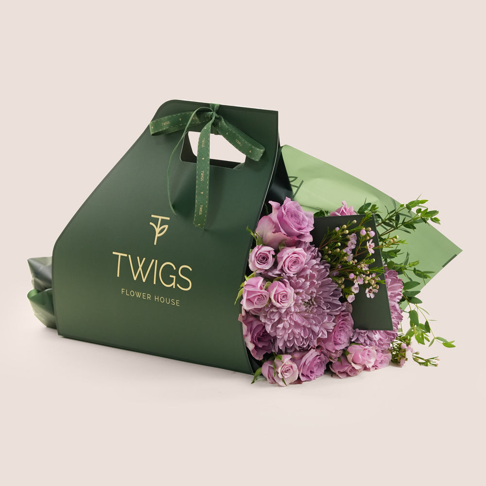 Emirati Women's Day lavender roses and purple chrysanthemums hand-tied bunch in a TWIGS bag, Green and Beige options